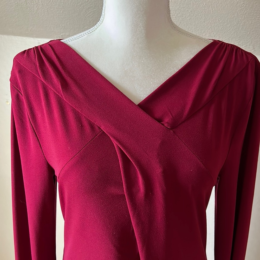 Ann Taylor long sleeve cross front V neck blouse.  Burgundy, wine color